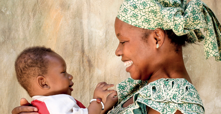 mother smiling at baby