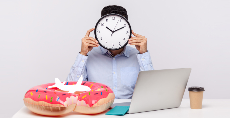 Man with clock covering face