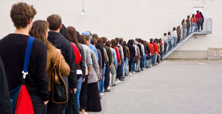 people standing in long line