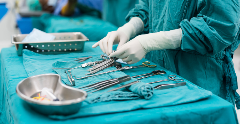 person handling medical equipment