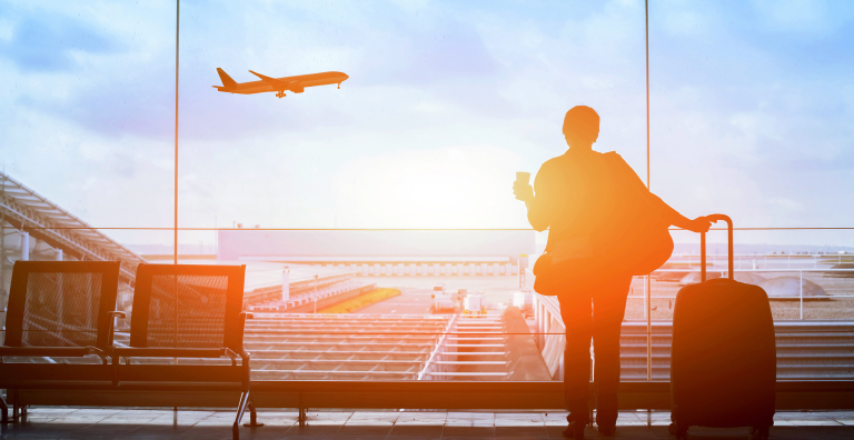 person watching plane take off