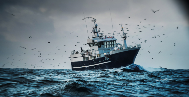 fishing boat on rough sea