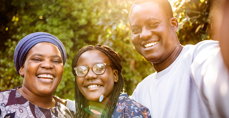 3 smiling people