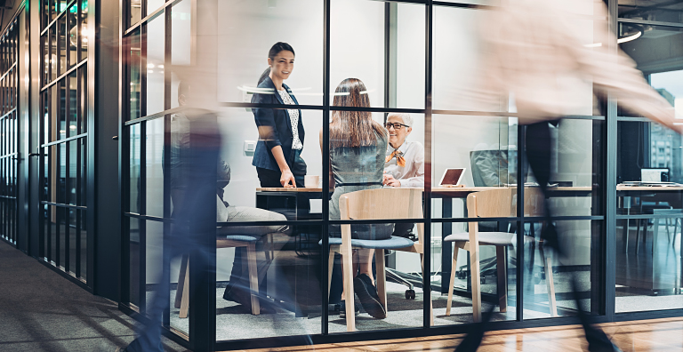 blurry people in office