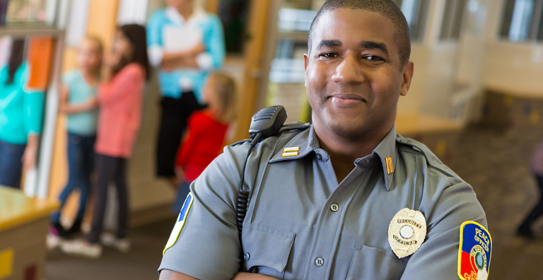 police officer in school building