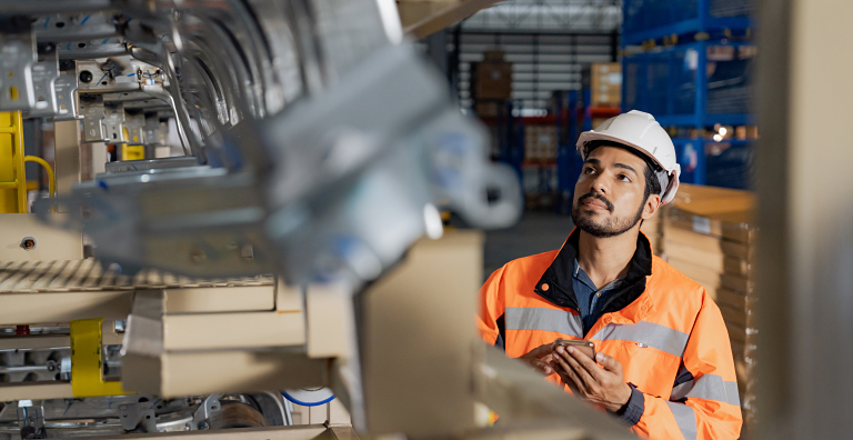 person standing by assembly line