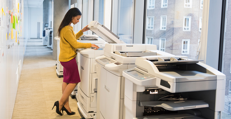 person using printer at office